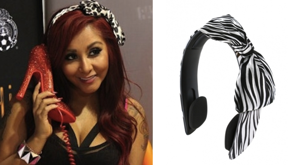 Not just a pretty bow on your pretty girl.  They're headphones in disguise.  Jersey Shore fashion statements.