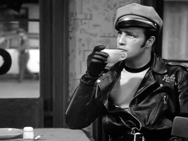 Marlon Brando drinks coffee at meetings in movies